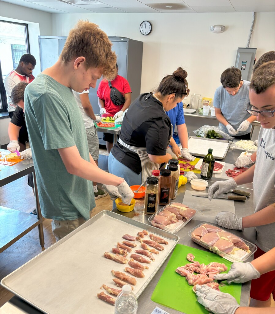 Students prepare a meal. 