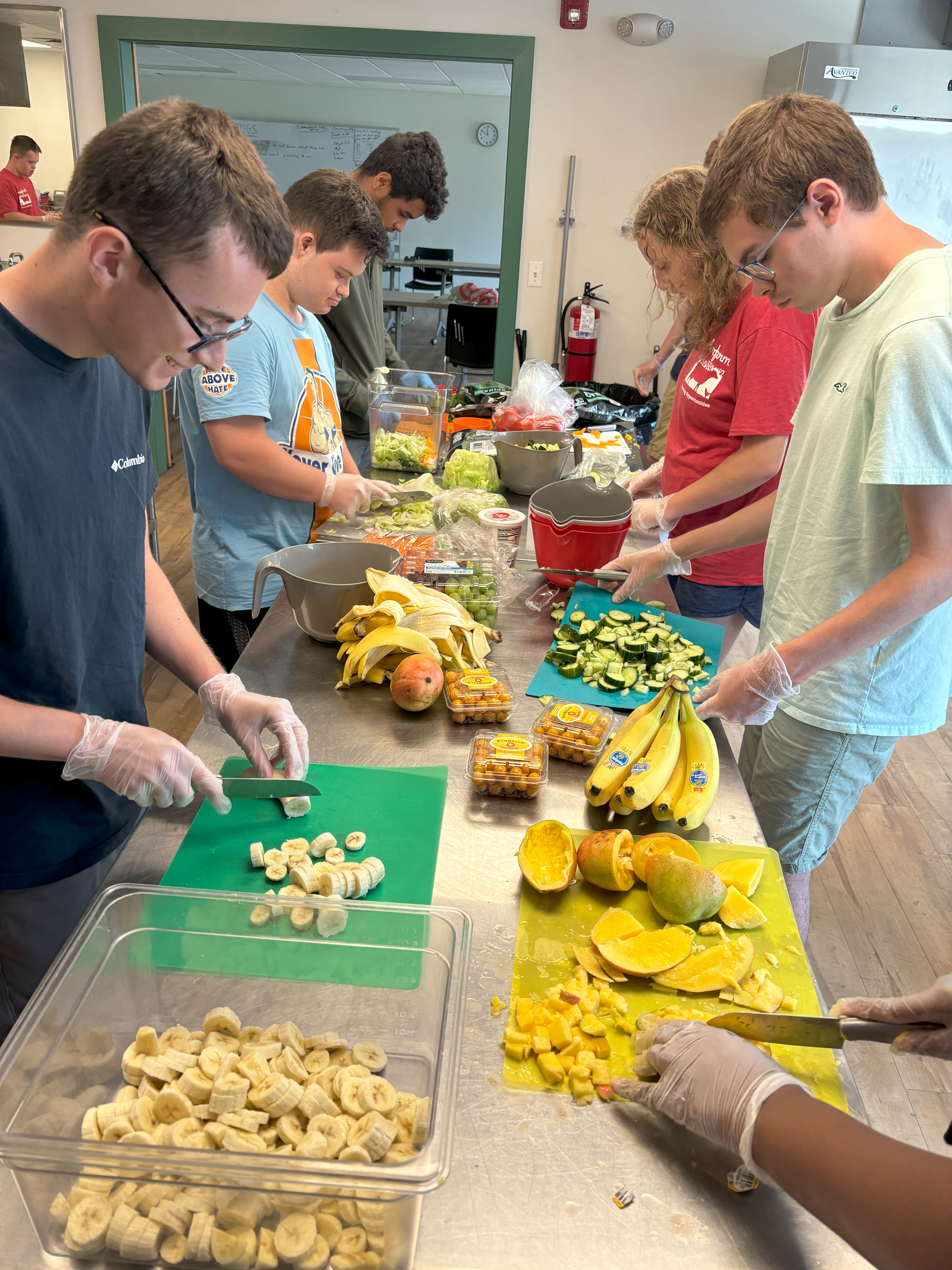 Students cute fruits and vegetables. 